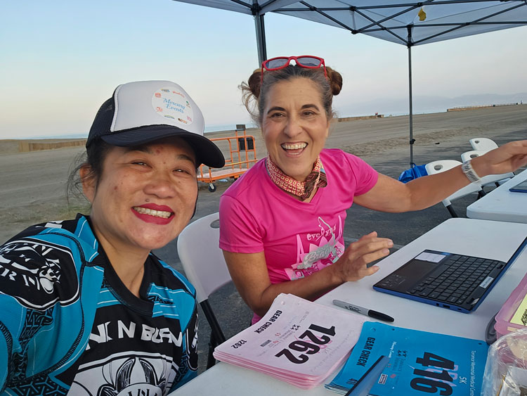 Ambassadors help at the expo and packet pick up. Checking people in at registration and helping answer questions is a fun way to give back while having fun helping new runners!